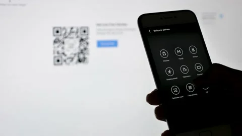 Scan the qr code with a mobile phone Stock Footage 134625127