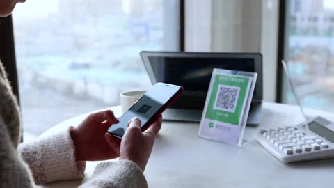Scan QR code payment on WeChat with smar... | Stock Video | Pond5