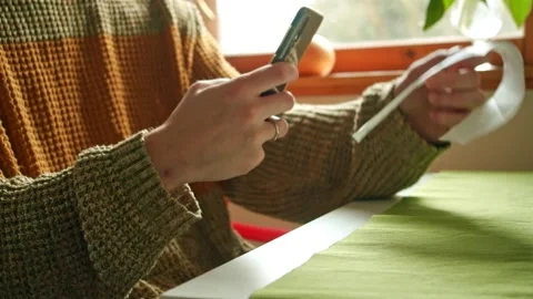 Scan A Qr Code In A Store And Pay For Goods. Man at home leads to management of Stock Footage 144017760