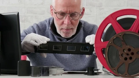 Scan slides to transform into digital data Stock Footage 82607143