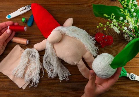 Scandinavian gnome making step by step handmade tutorial. Homemade fabric swe Fotos de archivo