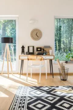 Scandinavian style workspace with clock Stock-Fotos