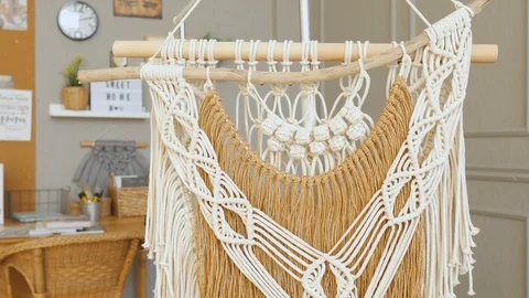 Scandinavian woven macrame weighed in a workshop Stock Footage 120974045
