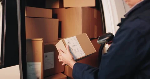 Scanner, package and hands of deliveryman by van for pricing, barcode or 動画素材 341577389