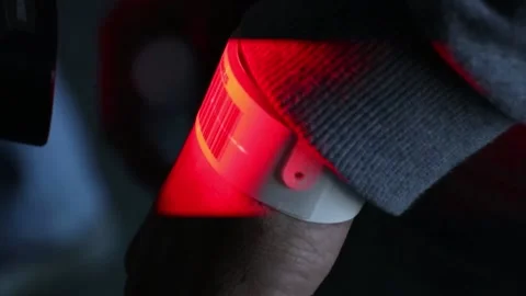 Scanner reading barcode on security wristband Stock Footage 234407714