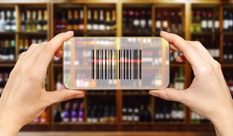 Scanning bar code in retail store using smart phone. Electronic shelf label c Stock Photos