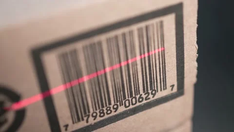 Scanning the Bar Code of a Shipping Label of a Cardboard Box Stock Footage 185122379