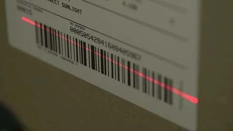 Scanning a Barcode on a Box Stock Footage 122543662