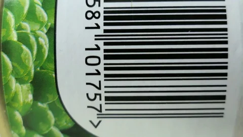 Scanning Barcode On Green Peas Can With Red Laser Stock Footage 82902664
