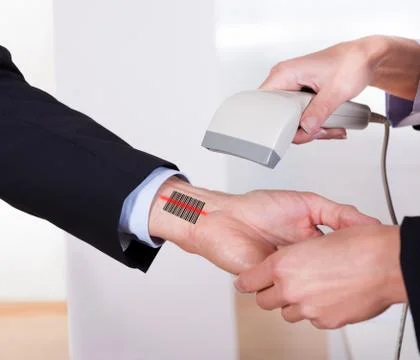 Scanning barcode on the hand Stock Photos