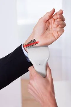 Scanning barcode on the hand Stock Photos