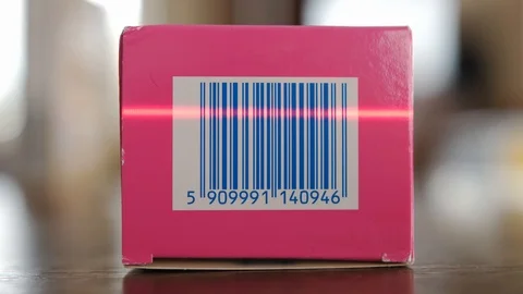 Scanning Barcodes of Multiple Products with Red Laser Barcode Scanner Stock Footage 104618782
