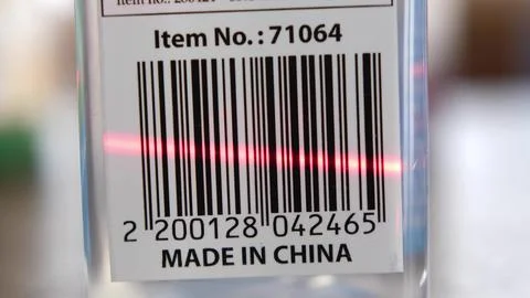 Scanning Barcodes of Multiple Products with Red Laser Barcode Scanner Stock-Fotos