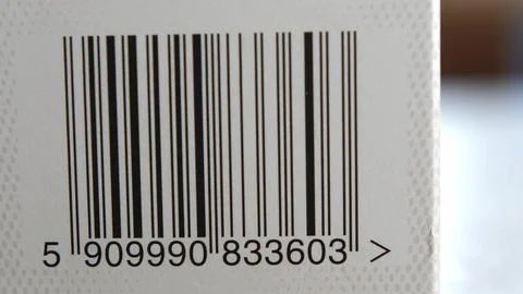 Scanning Barcodes of Multiple Products with Red Laser Barcode Scanner Stock-Fotos