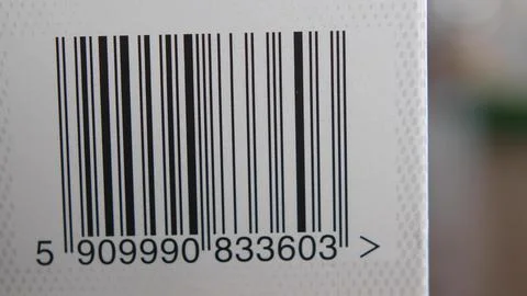 Scanning Barcodes of Multiple Products with Red Laser Barcode Scanner 스톡 사진