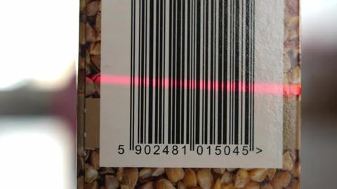 Scanning Barcodes of Multiple Products with Red Laser Barcode Scanner Stock-Fotos