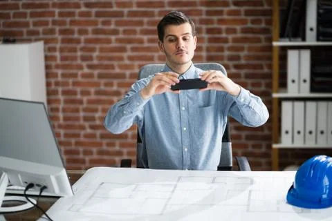 Scanning Blueprint Plan Document Using Phone Stock Photos