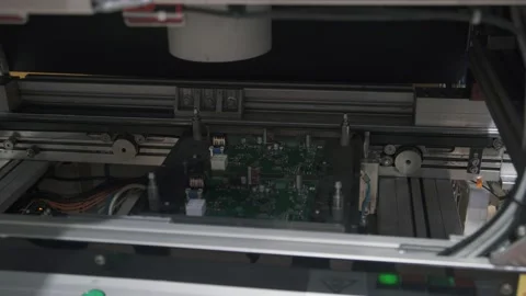 Scanning the board after it has been delivered on the conveyor. Close-up video Stock Footage 144348031