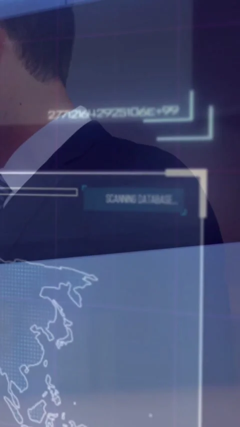 SCANNING DATABASE UI appearing, exec turning left behind fixed UI, observing map Stock Footage 334540749