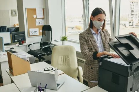 Scanning document in office Stock Photos