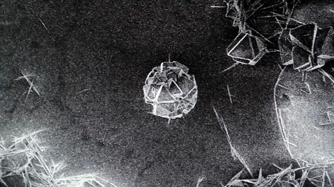 Scanning Electron Microscope View of Crystalline Structure in 4K Stock Footage 316851699