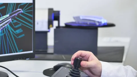 Scanning an Industrial Part using a Controller of Professional 3D Scanner 動画素材 124579797