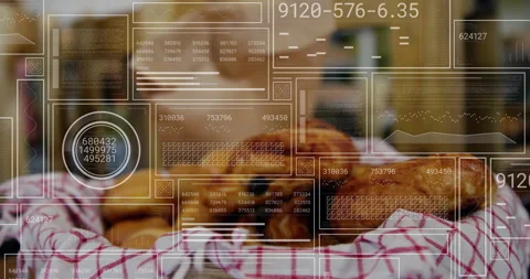Scanning interface fading in over bakery pastries, updating panels and gauges 스톡 동영상 312770933