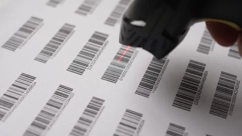 Scanning Many Different Bar Codes On a Sheet of Paper Stock Footage 256690763