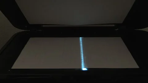Scanning or copying a document in obscure darkness. Scanner light. Sound. Video stock 42310111