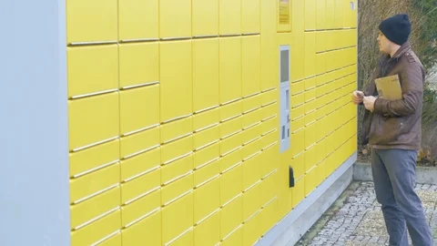 Scanning a parcel at a parcel station Video stock 97406283