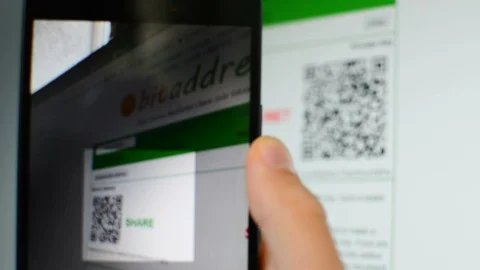 Scanning QR code with mobile phone from computer and paying with bitcoin in shop 스톡 동영상 93791293
