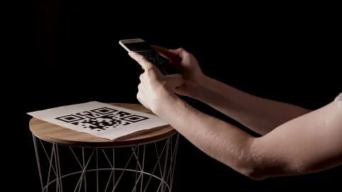 Scanning the QR code with a mobile phone Video stock 147068543