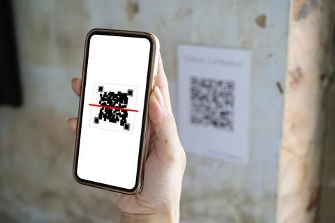 Scanning QR code with mobile smart phone. Isolated on white background. Qr co Stock Photos
