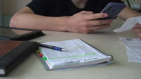 Scanning a QR code from a receipt Stock Footage 139080404