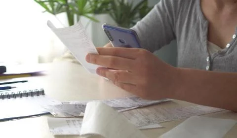 Scanning a QR Code From a Receipt Stock Photos