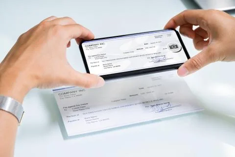 Scanning Remote Deposit Check Document Using Phone Stock Photos