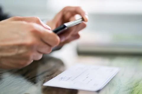 Scanning Remote Deposit Check Document Using Phone Stock Photos