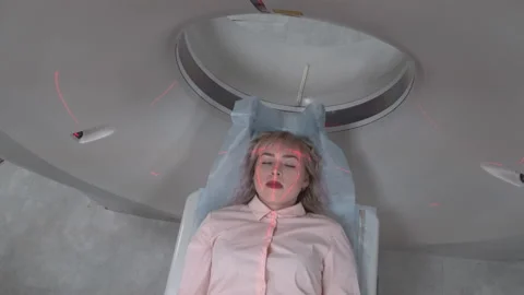 A scanning room with computers and monitors next to the CT scan room in a new Stock Footage 107001535