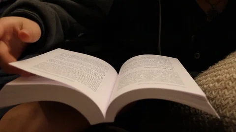Scanning through book Stock Footage 79048638