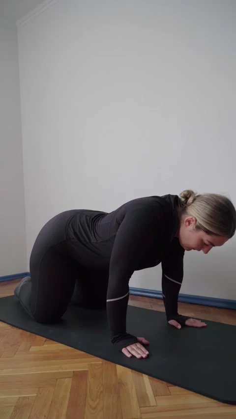 Scapular Push-Ups on All Fours for Shoulder Stability and Posture Rehab Stock Footage 340545114