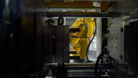 SCARA Robots arm in action Stock Footage 127796530