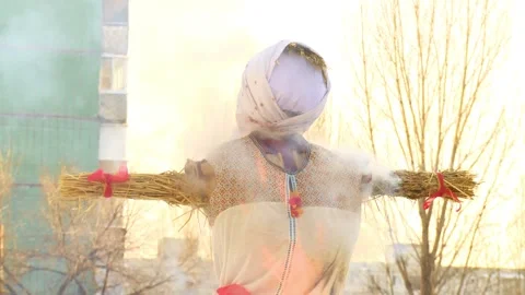 A scarecrow of straw burns Stock Footage 85854664