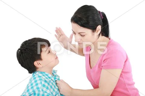 Scared 8 year old boy being abused or abducted by adult female. Stock Photos