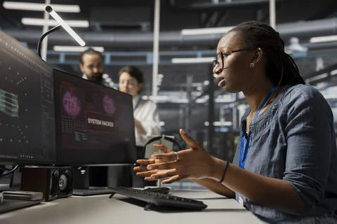 Scared admin in data center panicked by virus alert Stock Photos