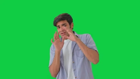 Scared and afraid Indian boy Green scree... | Stock Video | Pond5