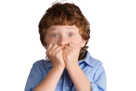 Scared Boy. Isolated on white background Stock Photos