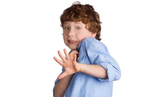 Scared Boy. Isolated on white background Stock Photos