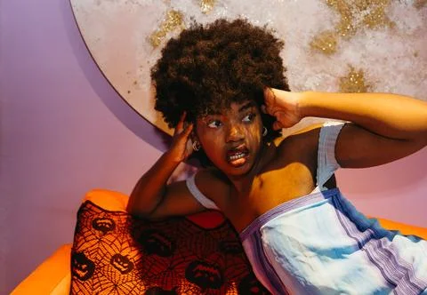 Scared Expression on Halloween Couch v Stock Photos