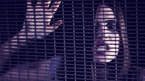Scared female zombie feeling trapped Stock Footage 75248016