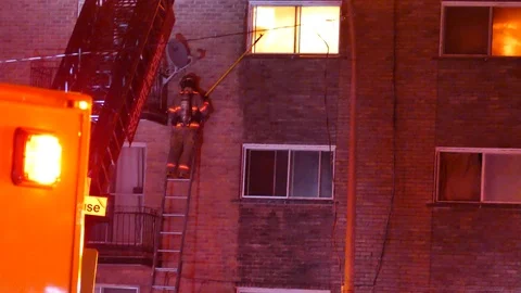 Scared firefighter on ladder Stock Footage 105292041